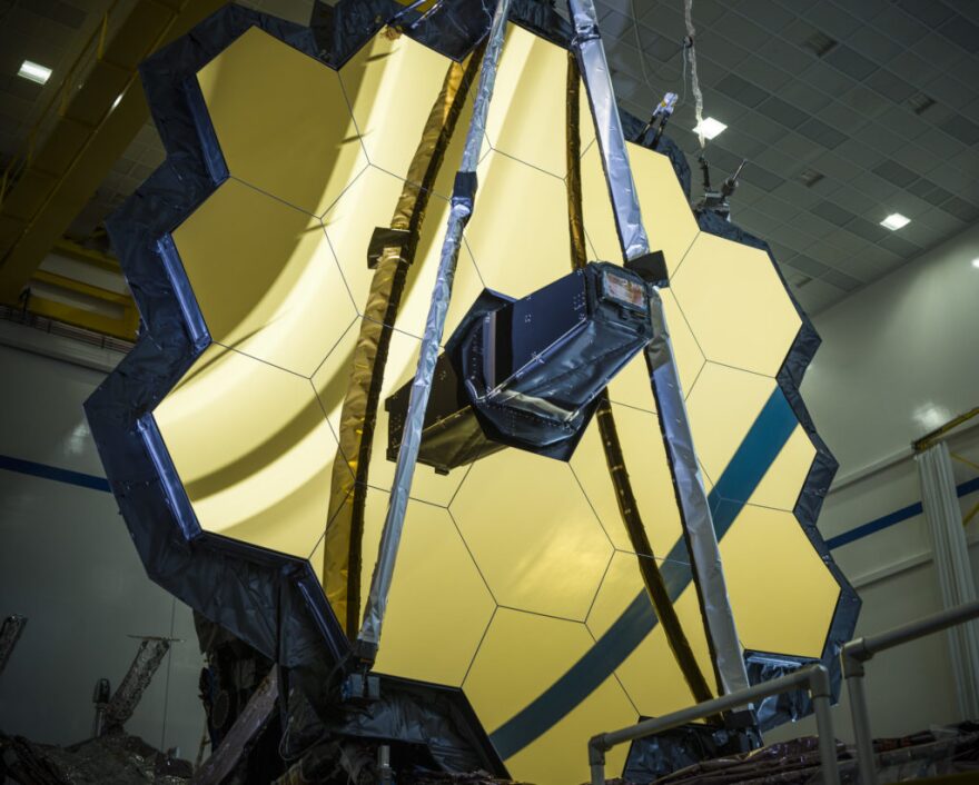 The James Webb Space Telescope’s light-gathering mirror contains 18 gold-plated hexagonal pieces. With a 21.3-foot diameter, it is nearly three times larger than the Hubble Telescope’s mirror.