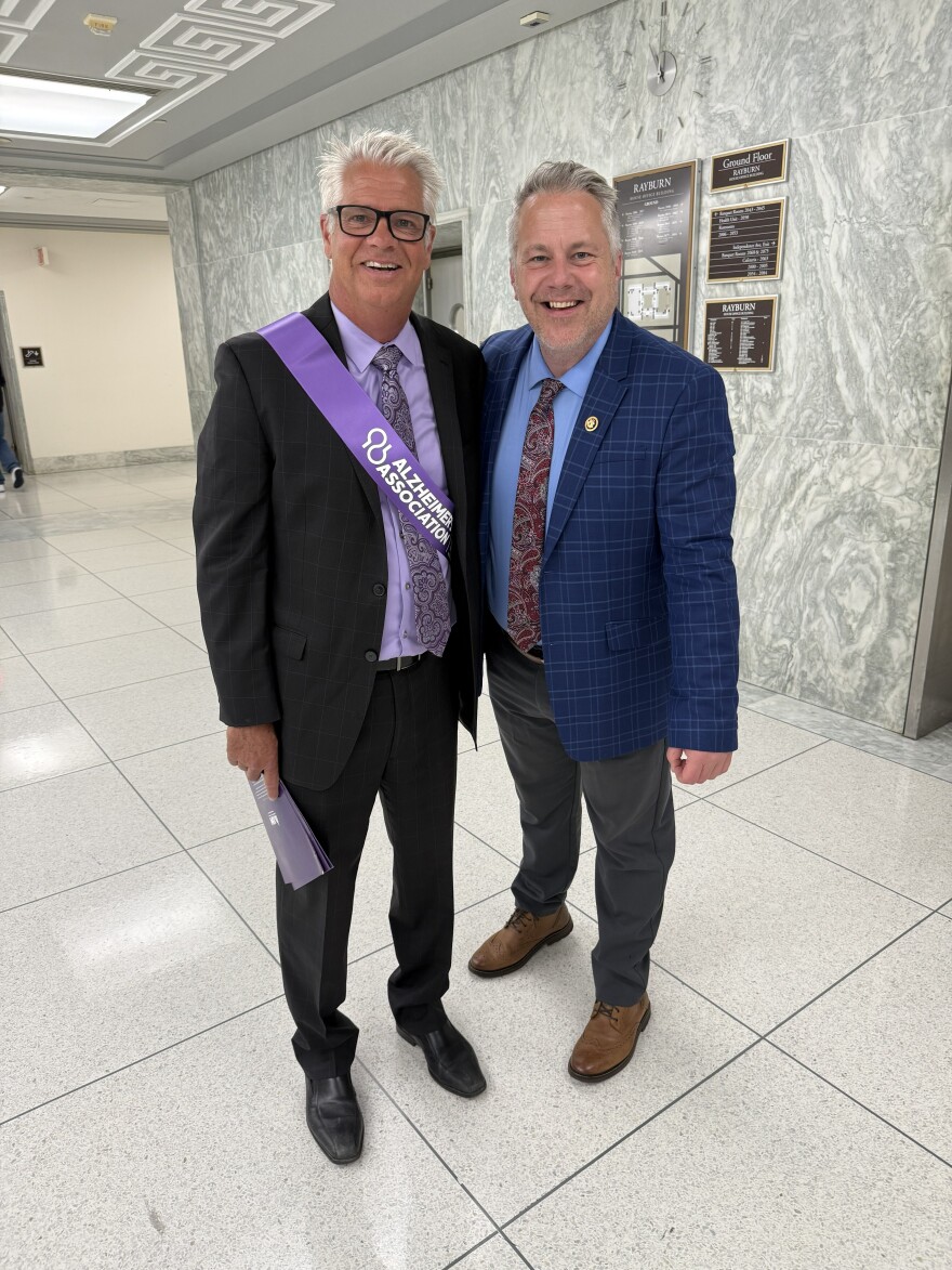 Adam Nielsen and Congressman Eric Sorensen in a capitol office building hallway
