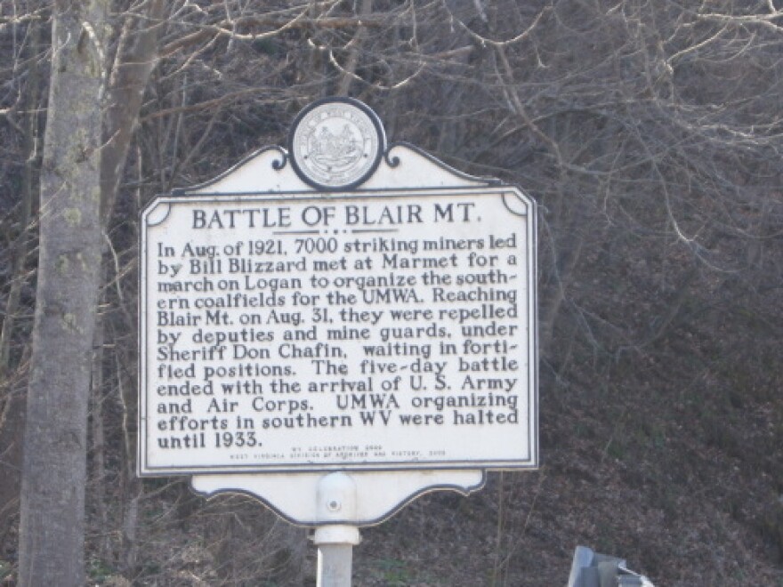 A sign commemorating the battle of Blair Mountain in Logan County, W.Va.