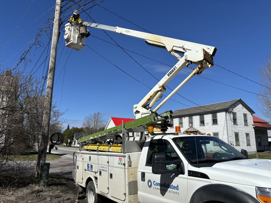 Keith Grovine with Consolidated Communications installs fiber on Vermont 128 in Essex on April 16, 2024.