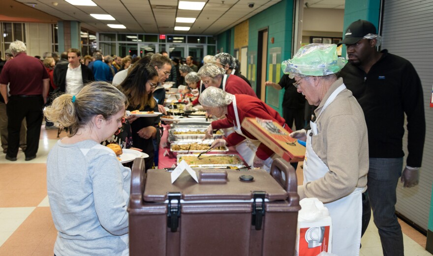 Turnout was high at a local potluck organized to help furloughed federal workers during the shutdown.