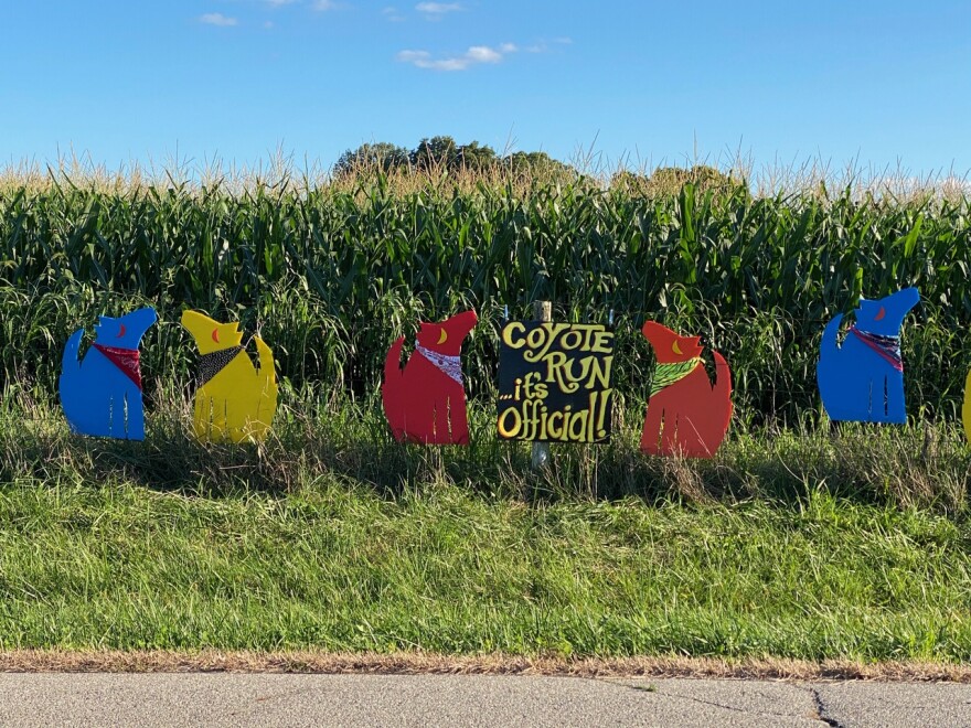 Coyote folk art on Garrison Road in Enon celebrating the official naming of the nearby stream