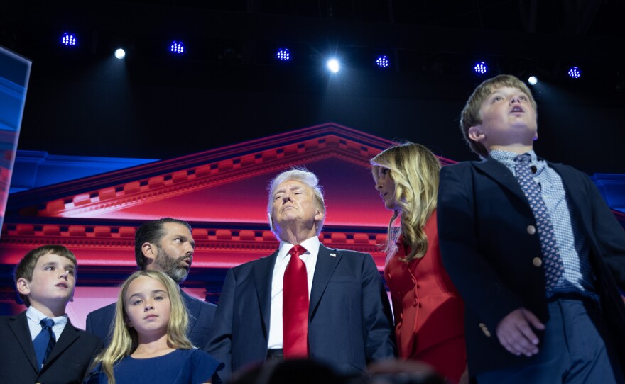GOP presidential nominee Donald Trump with his wife, Melania Trump, and family on the fourth night of the Republican National Convention in Milwaukee, Wisconsin on July 18, 2024.