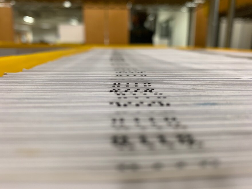 Mailed-in ballots await counting at the Pierce County election office in Tacoma, ahead of Washington state's March 2020 presidential primary.