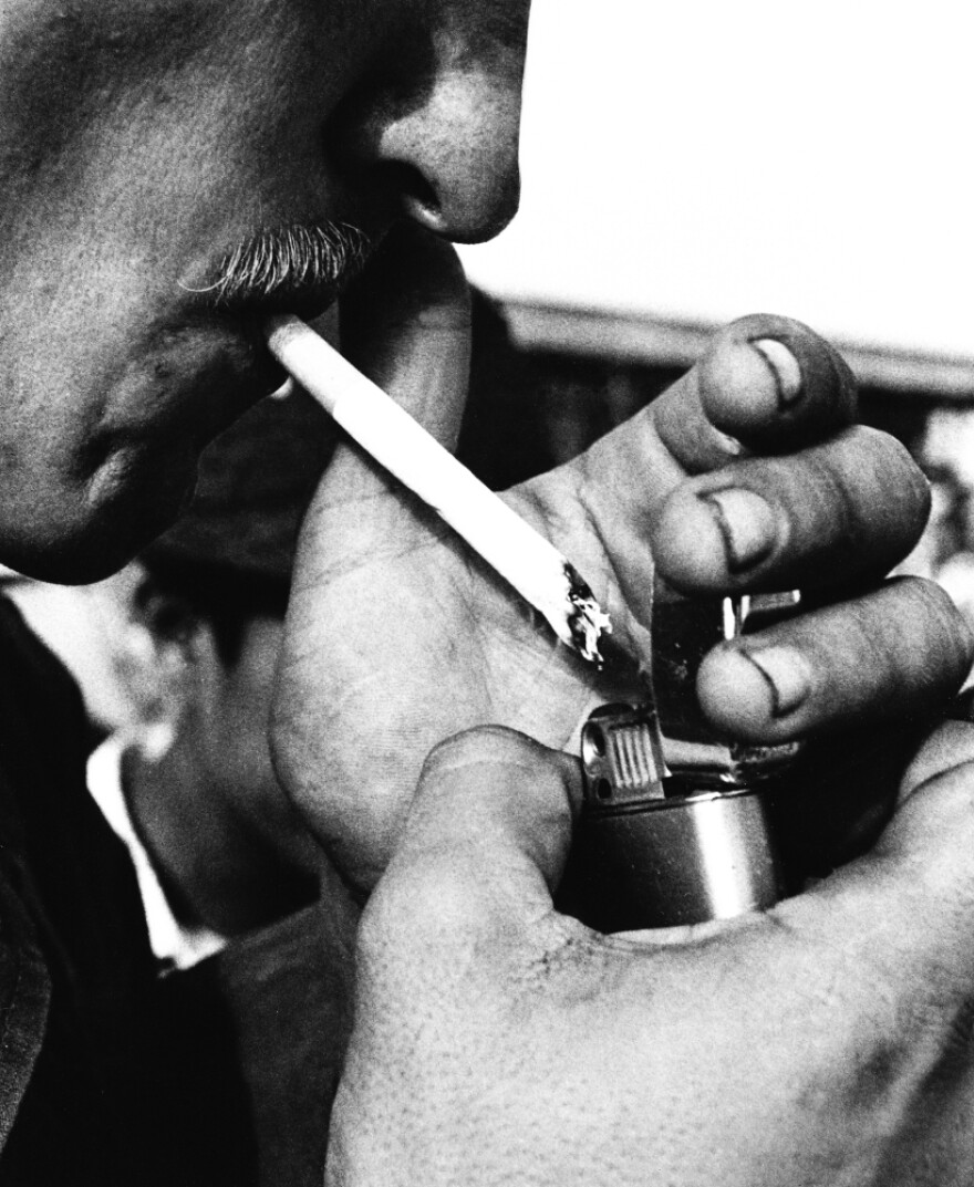 A GI lights up a cigarette in Saigon in 1971. He poured grains of heroin into the menthol cigarette, from which he had first removed some of the tobacco.