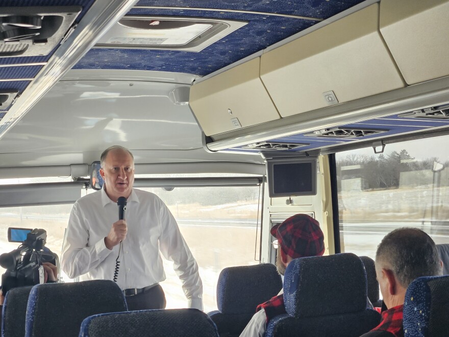 Bemidji Chamber of Commerce Executive Director Scott Turn addresses the bus on the ride down to Bemidji Day at the State Capitol in St. Paul on March 5, 2025.