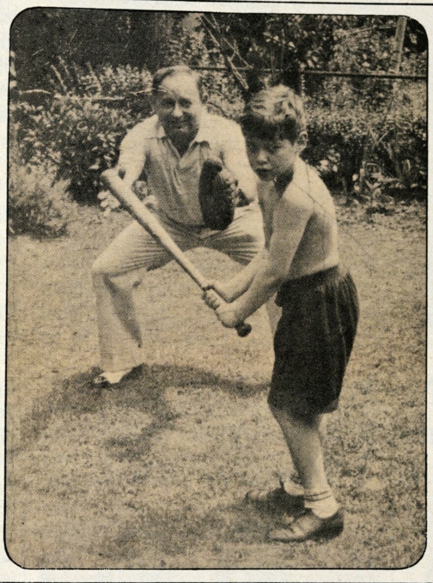 A young Jerry Izenberg with his father Harry