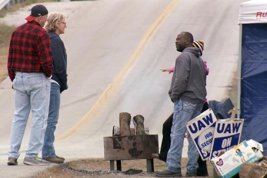 UAW members strike outside the GM Bedford Casting Facility.