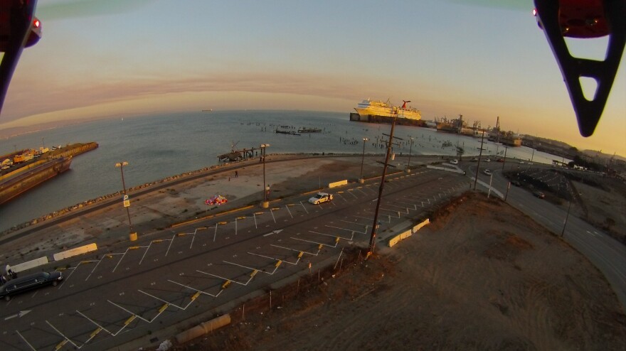 David Merrill attaches a camera to his drone to take photos of scenes like this one of Mission Bay, Calif.