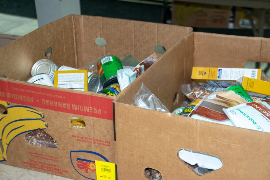 An example of the packed up food boxes given away at the Poneto food pantry. The protein options on this day were packaged salmon and pecans.
