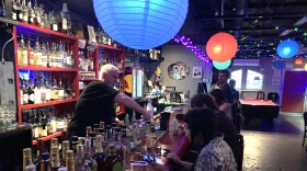 Manager Dan Friessen tends bar at Barbara's Pavilion. The bar won't be hosting any watch parties for the World Cup, but they are offering a safe, welcoming space for visitors during the Tournament.