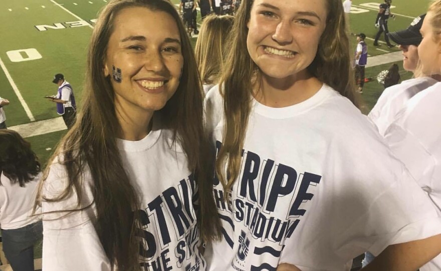 The two friends at a USU Aggies football game