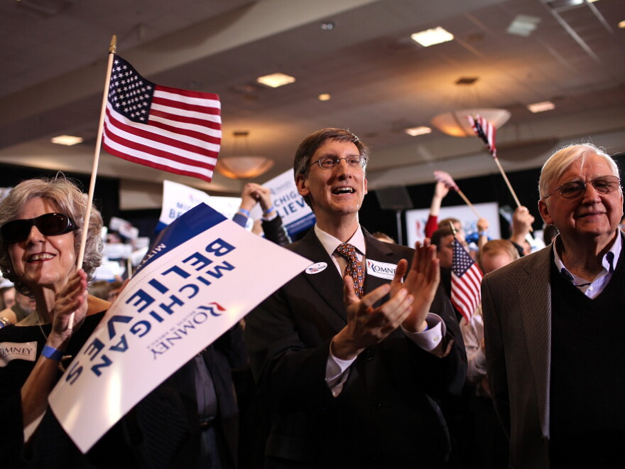 Supporters of Republican presidential candidate Mitt Romney celebrate on Feb. 28, 2012 in Novi, Michigan. Romney was declared the winner of the Arizona and Michigan primaries.