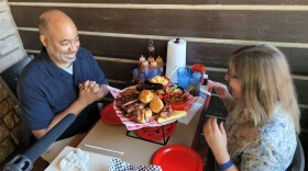 Colorado Edition's Erin O'Toole chats with Black Smoke author Adrian Miller at Nordy's Barbecue and Grill in Loveland, Colorado.