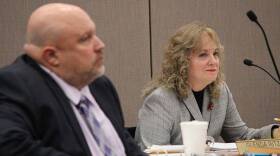 State Superintendent Glenda Ritz and fellow State Board of Education member Byron Ernest listen during December's meeting.