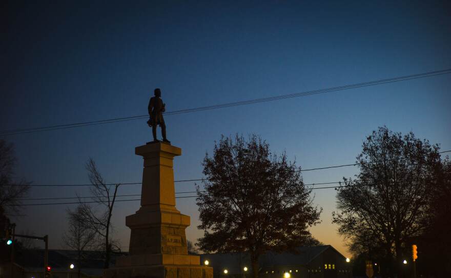 The statue of Confederate Lieutenant General A.P. Hill stands as dawn begins to break on Monday, Dec. 12, 2022 in Richmond, Va.