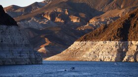The mineral "bathtub ring" left by receding water shows how much Lake Mead has shrunk during two decades of drought.