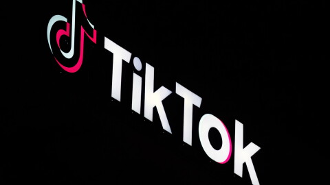 A TikTok sign is displayed on top of their building in Culver City, California. It shows a musical note followed by the words "Tik Tok."