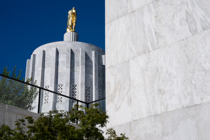 The Oregon Pioneer statue sits atop the Oregon State Capitol in Salem, Ore., on Sept. 8, 2026.