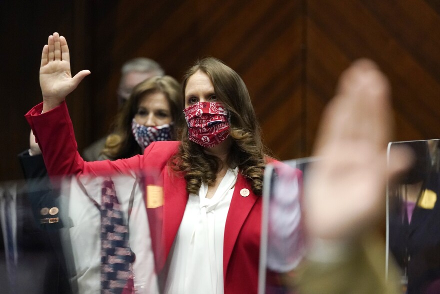 Rep. Michelle Udall, R-Mesa, is sworn in during the opening of the Arizona Legislature at the state Capitol Monday, Jan. 11, 2021, in Phoenix. Udall defected from a united GOP front on Thursday, Feb. 24, 2022, to defeat a measure that would have banned manufacturing or prescribing medication that would cause an abortion. The bill that unexpectedly failed would have eliminated the choice used by half of the people who have abortions in the state, leaving a surgical procedure as the only option. "Members, I am about as pro-life as they come," Udall of Mesa said as she joined all Democrats in voting against the measure. "However, in my research of some of these medications, they are used for other purposes as well.