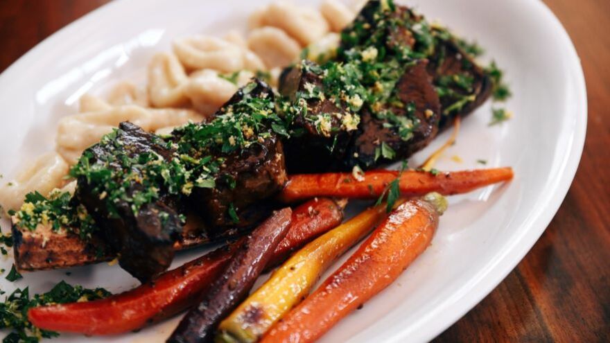 Braised short ribs, horseradish sour cream mashed potatoes and gremolata at BLU HWY.