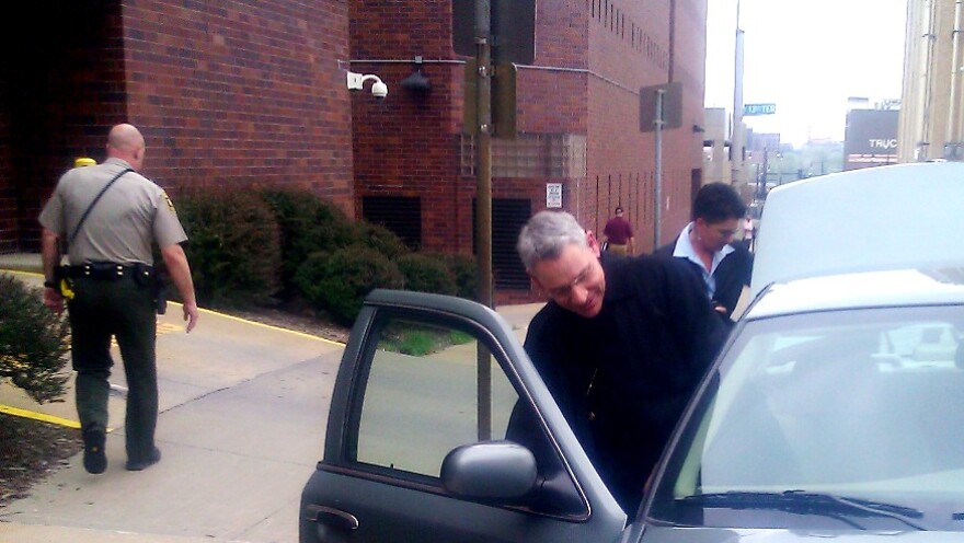 Bishop Robert Finn leaves Jackson County Courthouse, Kansas City, MO., after attempts to dismiss historic criminal case against him.