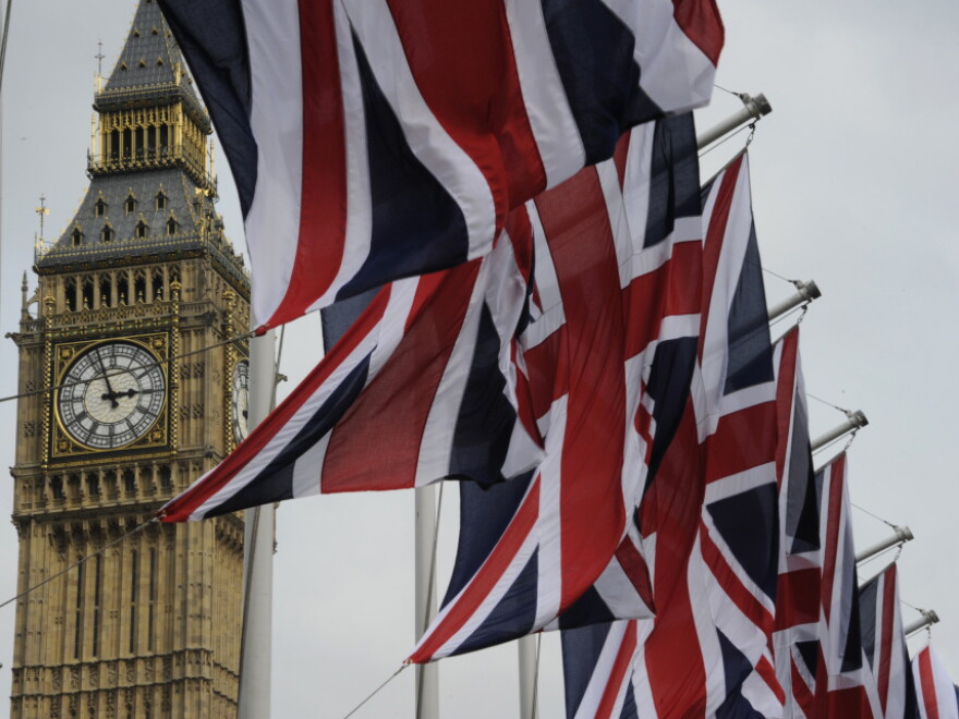 British Union Jack flags fluttered in the wind next to Big Ben, in London, on Thursday (April 28, 2011).