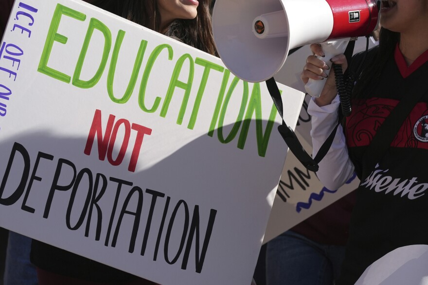 FILE - Students march at Arizona State University in protest of ASU's chapter of College Republicans United-led event encouraging students to report "their criminal classmates to ICE for deportations", Jan. 31, 2025, in Tempe, Ariz. (AP Photo/Ross D. Franklin, File)