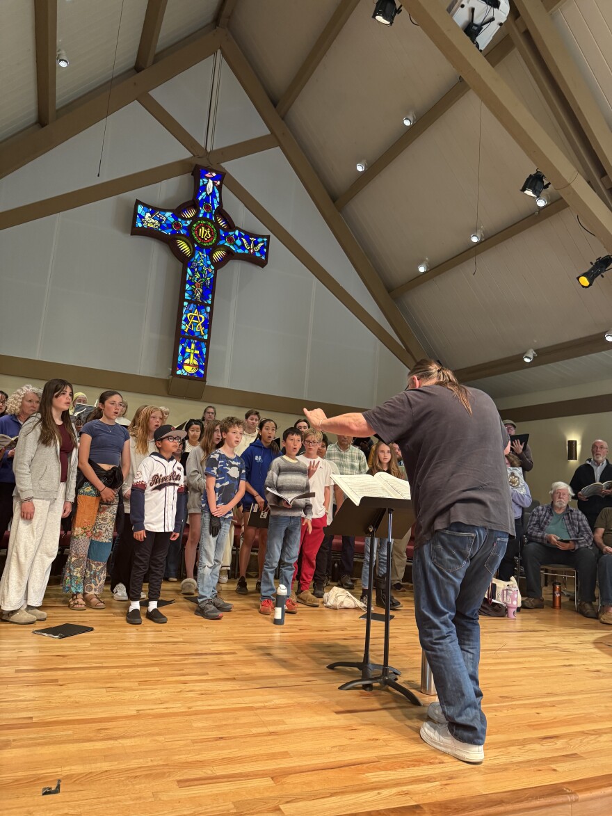 Maestro Daniel Henriks leads a rehearsal of the I Cantori Chorus performing "Carmina Burana."