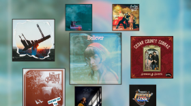 Artwork for four albums and three singles displayed in black square frames over a blurry blue-green background. In the top row from left to right: A person carrying a marimba on their back with the sun setting behind them, a hazy blue-green tinted photo of a woman wearing a red bandana, two people holding an upright bass and acoustic guitar inside a gold frame with red around it. In the bottom row from left to right: A woman in a dress with her arms above her head, a woman in a dark room with sun coming through a window, a pot on a hot plate with steam rising from it, and hard to make out red and white image of an amp with foliage around it.
