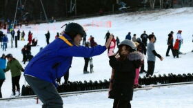 Two people enjoy a ski outing.