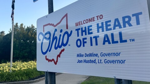 A tourism sign welcomes visitors to a rest stop in Scioto County, Ohio.