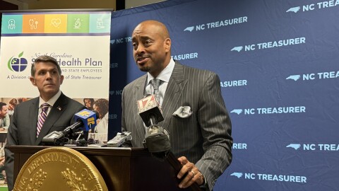Roy Watson, Jr., a vice president at Blue Cross NC, speaks Friday afternoon after the N.C. State Health Plan Board of Trustees voted to re-install the insurer as the plan's third party administrator beginning in 2028. State Treasurer Brad Briner said Blue Cross was a clear standout in response to the state's RFP.