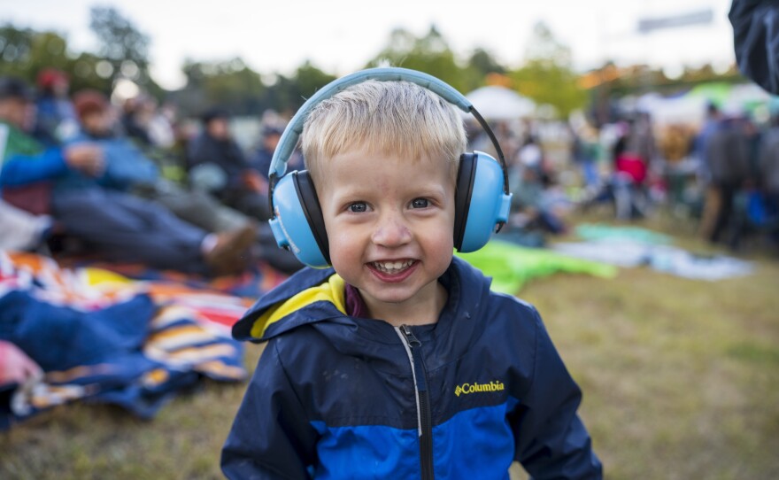 Attendees, young and old, donned hearing protection during Grand Rapids Riverfest on Sept. 6, 2025.