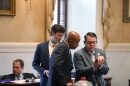 Republican South Carolina Sen. Carlisle Kennedy, left, Democratic Sen. Ronnie Sabb, middle, and Republican Sen. Jeff Zell, right, watch a video during a session on redistricting on Tuesday, May 26, 2026, in Columbia, S.C. (AP Photo/Jeffrey Collins)