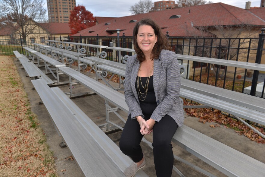  Pembroke Hill  graduate and multi-sport athlete Katherine Fox sits on the bleachers overlooking the now-soccer pitch where she played field hockey.