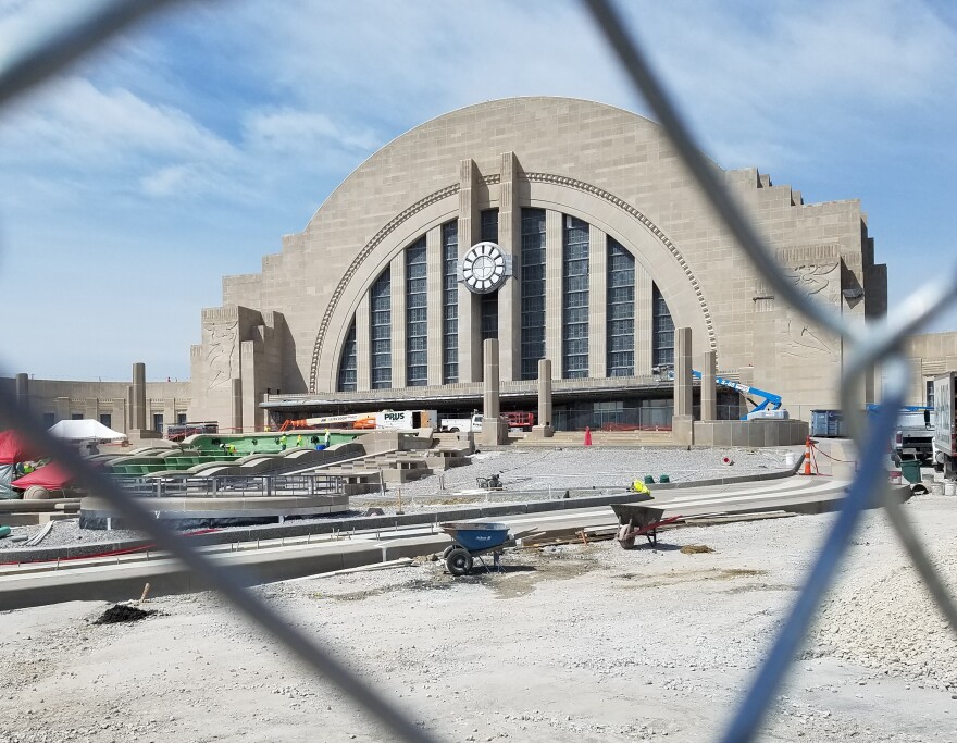 Construction crews work on reinstalling the fountain in front of Cincinnati's Union Terminal on Aug. 24, 2018.