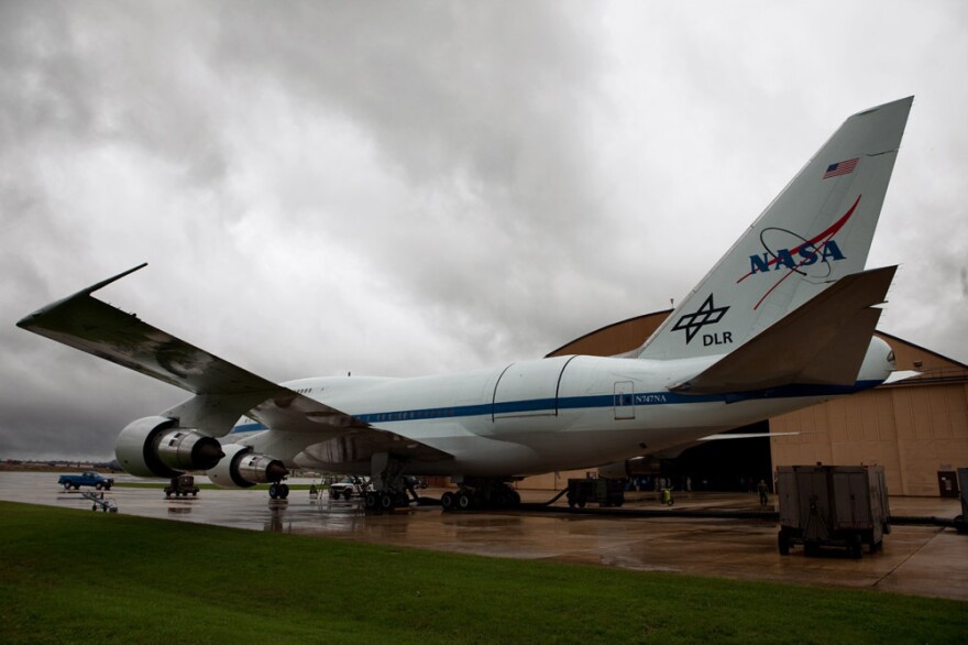 A hatch near the tail of the plane opens to let SOFIA's telescope peer out. The plane-mounted telescope flies above most of the moisture in the Earth's atmosphere, allowing for clearer images than can be captured from ground-based telescopes.