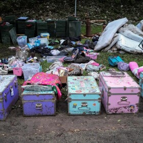 Campists' belongings lie on the ground following flooding on the Guadalupe River at Camp Mystic in Hunt on July 7, 2025.
