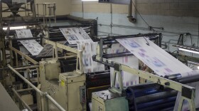 Rolls of paper speed through The Alpena News’ printing press on Thursday, July 31, 2025 for the next day’s newspaper.