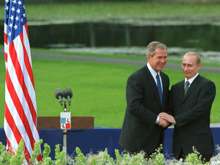 Former President George W. Bush and Russian President Vladimir Putin shake hands during their joint press conference June 16, 2001 in  Ljubljana, Slovenia.