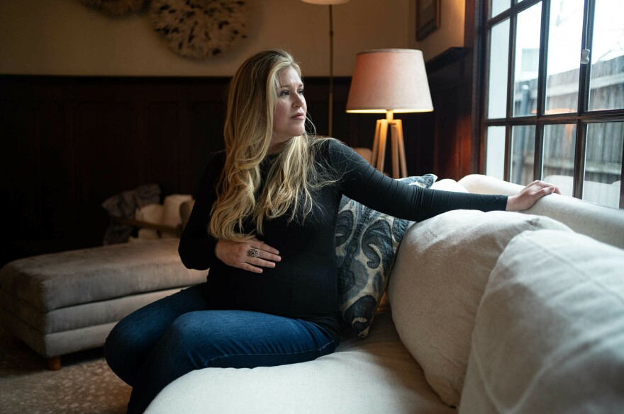 Lauren Miller at her home in Dallas, Texas, in January 2023. When she was 15 weeks pregnant, she traveled to Colorado to have a "selective reduction" abortion, after one of her twins was diagnosed with a fatal condition.