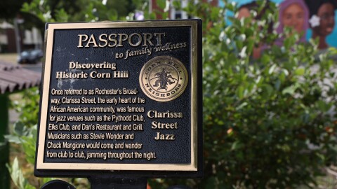 A plaque at the corner of Troup Street and Clarissa Street marks where the Pythodd Club once stood in Corn Hill. The area was know for many jazz venues in the African American community.