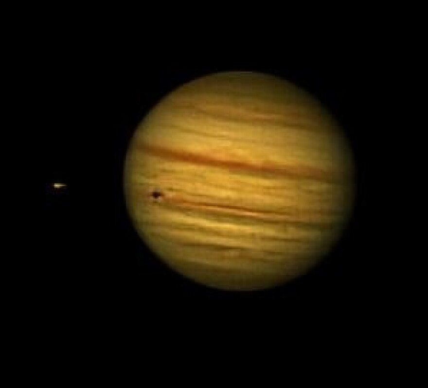 A shot of the huge moon Ganymede, just to the left of Jupiter on August 8.