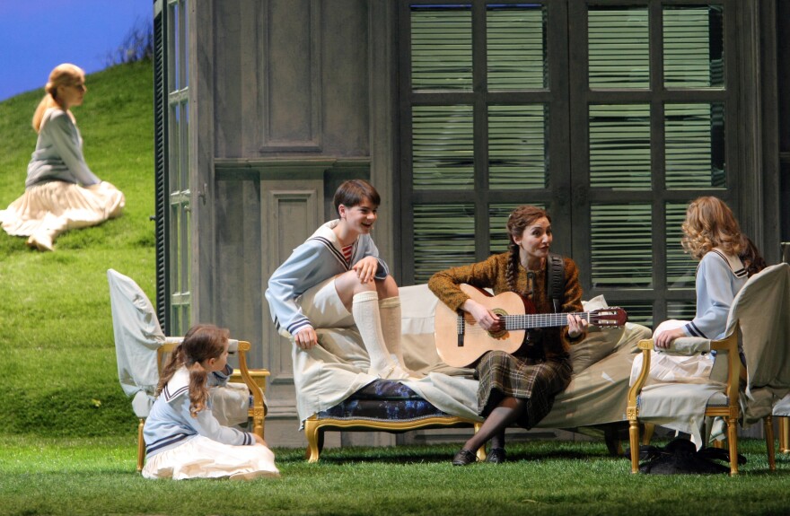 Singer Sylvia Schwartz plays the guitar during a rehearsal of the 'The Sound of Music' in 2009 in the Chatelet Theatre in Paris. The theater has produced a series of American musicals to sold-out audiences in recent years.