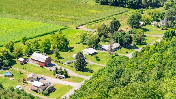 This image shows an aerial view of New York state farms and homes.