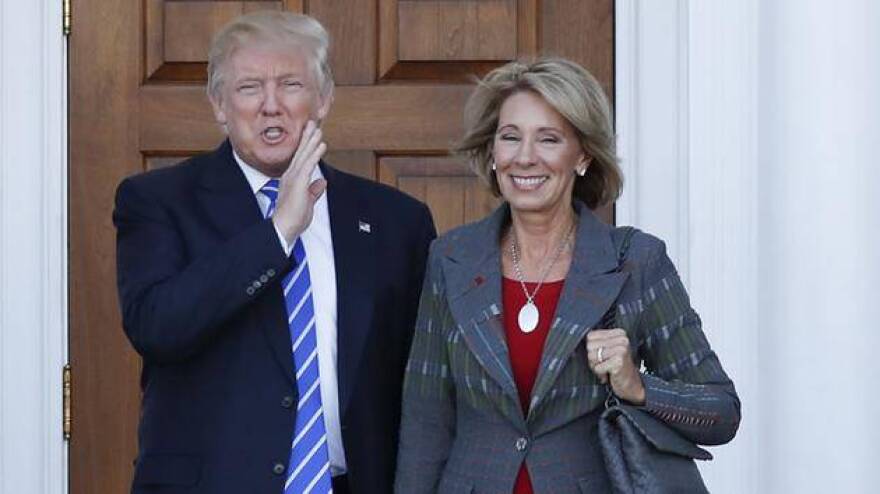 Donald Trump and Betsy Devos