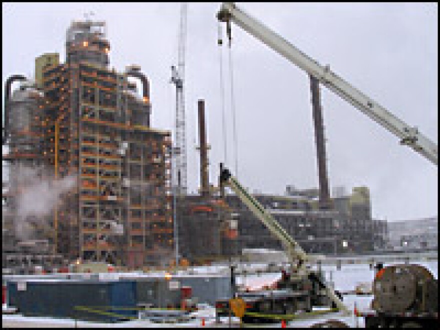 The "upgrading" facility is where tar sands are processed into synthetic oil. The operation relies on power from natural gas to extract the oil.