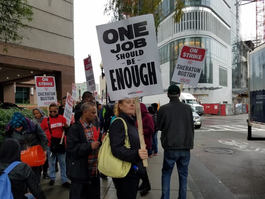 Hotel workers on strike outside the Sheraton Hotel in Back Bay. More than 1,500 workers at 7 Marriott International hotels in Boston are on strike Wednesday. (Zeninjor Enwemeka/WBUR)