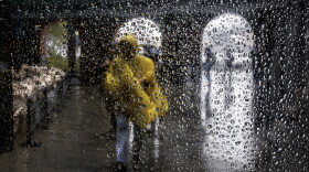 FILE: First Nor'Easter of the season hits the East Coast. People walk through Brooklyn in the rain as New York City experiences wind and rain associated with a nor’easter storm moving through the region on October 13, 2025 in New York City.